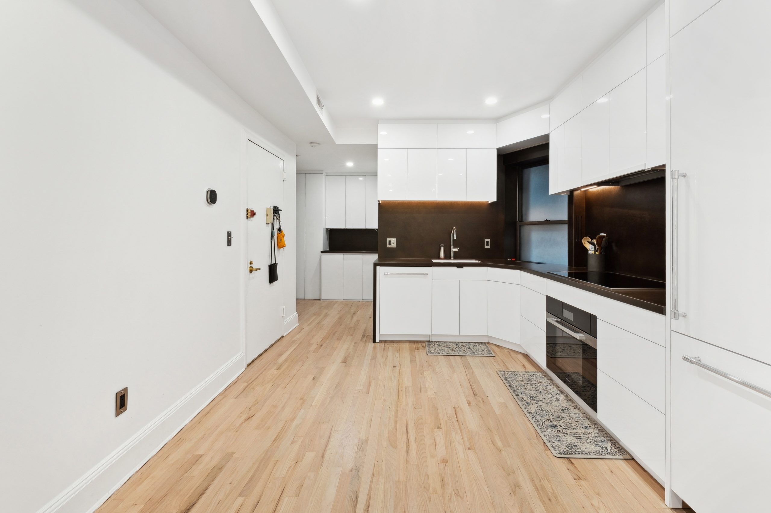 Surfaces, Lighting & Finishes for kitchen remodeling in New York City by Essential Remodeling