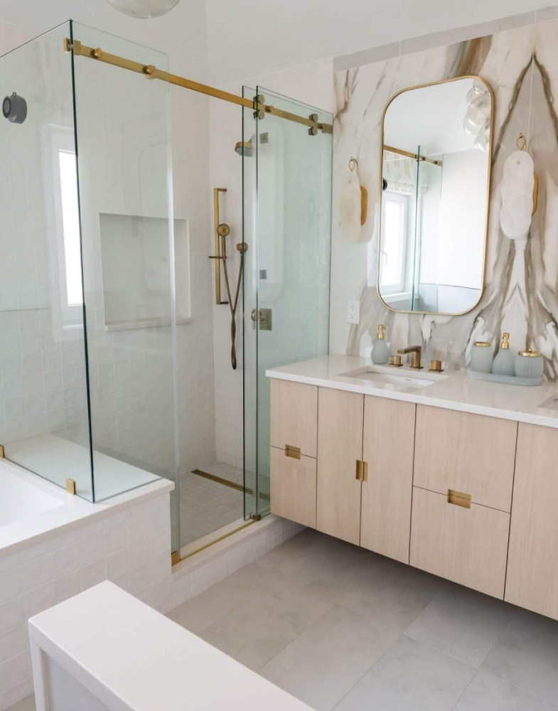Luxury bathroom with modern shower and custom vanity installation