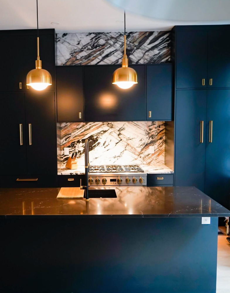 Luxury kitchen renovation featuring modern cabinetry and elegant lighting